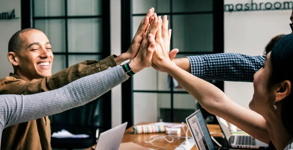 Group of people happy and working together